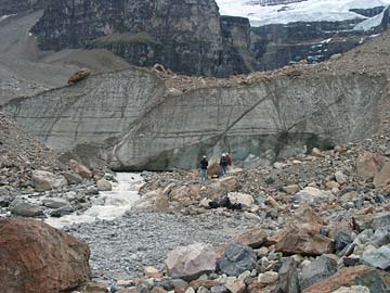 Glacial till being reworked by a meltwater stream at the toe of a glacier