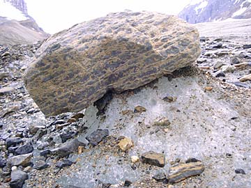Glacial till carried by a glacier, AB